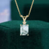 Emerald cut moss agate pendant necklace with floral diamond accents