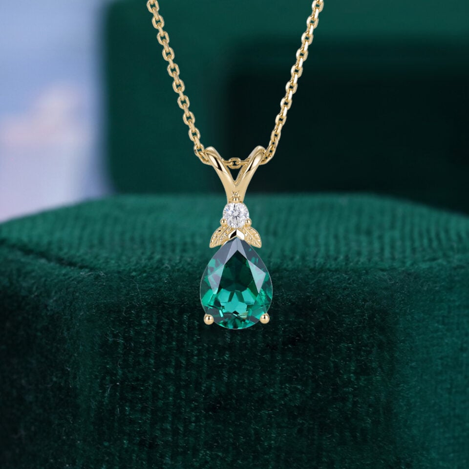 Garden Themed Pear Cut Emerald Leaf Pendant Necklace with Diamond Accents