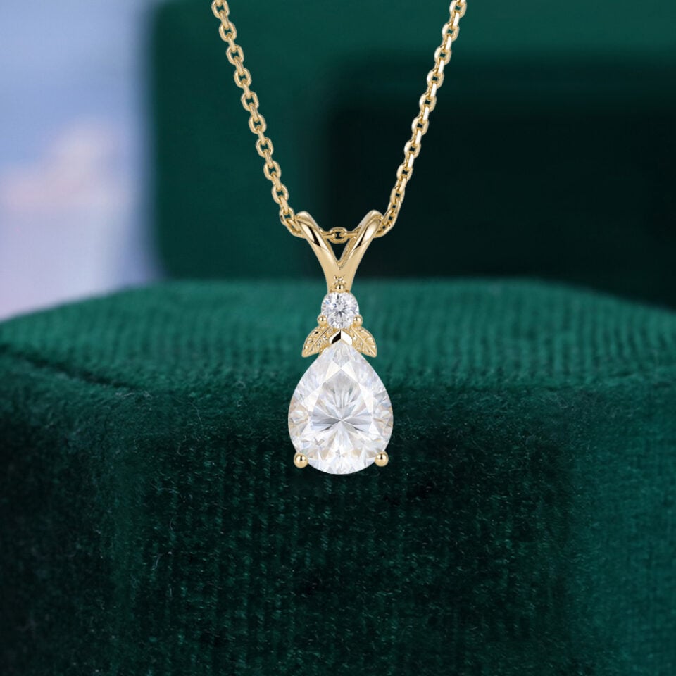 Garden Themed Pear Cut Moissanite Leaf Pendant Necklace with Diamond Accents