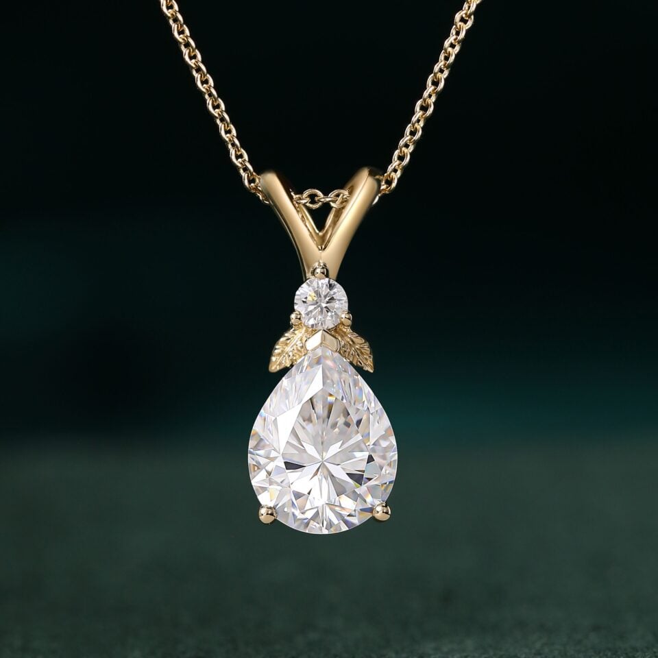 Garden Themed Pear Cut Moissanite Leaf Pendant Necklace with Diamond Accents