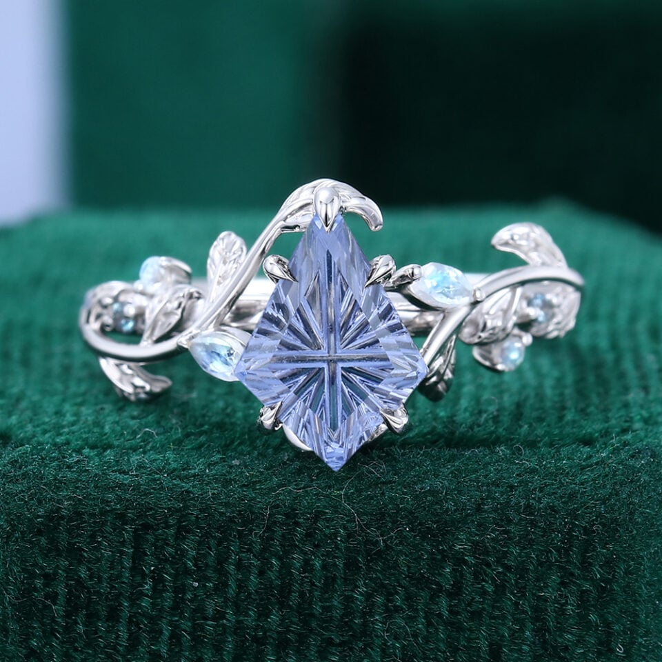 LeafLace | Fantasy Cut Kite Shaped Lab Cornflower Sapphire Engagement Ring Moonstone & Alexandrite Accented Leaf Design Ring