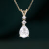 Pear Cut Moissanite Three Stone Pendant Necklace with Diamond Accents (27)