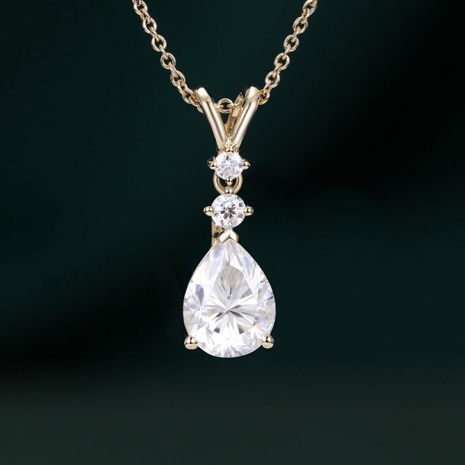 Pear Cut Moissanite Three Stone Pendant Necklace with Diamond Accents