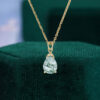 Pear cut moss agate infinity solitaire pendant necklace