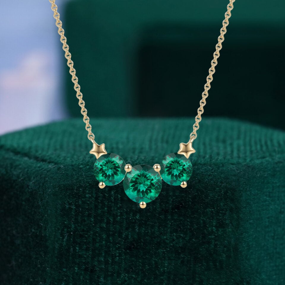 Round Cut Emerald Three Stone Necklace with Star Accents