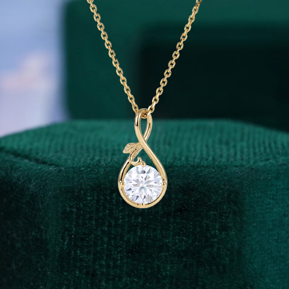 Round Cut Moissanite Infinity Pendant Necklace With Leaf Accents