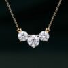 Round Cut Moissanite Three Stone Necklace with Star Accents (15)