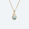 Round cut moss agate infinity pendant necklace with leaf accents