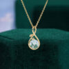 Round Cut Moss Agate Infinity Pendant Necklace With Leaf Accents (8)