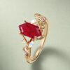 LeafLace Fantasy Cut Long Hexagonal Ruby Engagement Ring with Moonstone & Amethyst Accents (5)