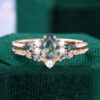 Pear Cut Moss Agate Bridal Ring Set With Leaf Accents (1)