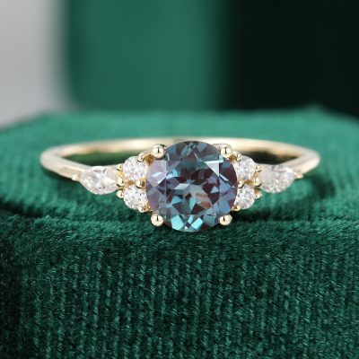 Round Cut Alexandrite Gold Engagement Ring with Diamond Cluster Accents
