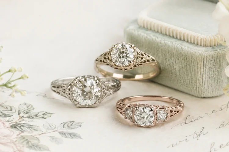 Custom vintage engagement rings in mixed metals with filigree, milgrain, and oec diamonds