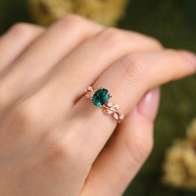 The Visual Impact of a Nature-Inspired Oval Cut Emerald Engagement Ring