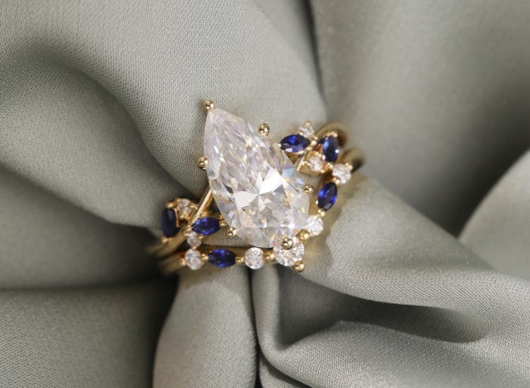 Elongated pear moissanite engagement ring set