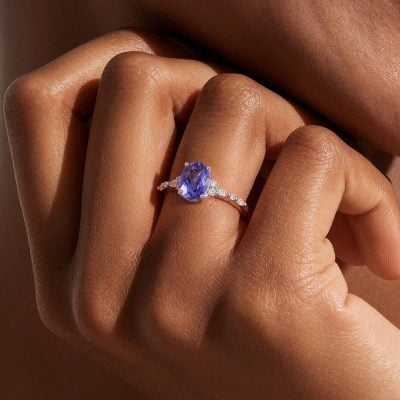 Oval Cut Cornflower Blue Sapphire Engagement Ring on Hand