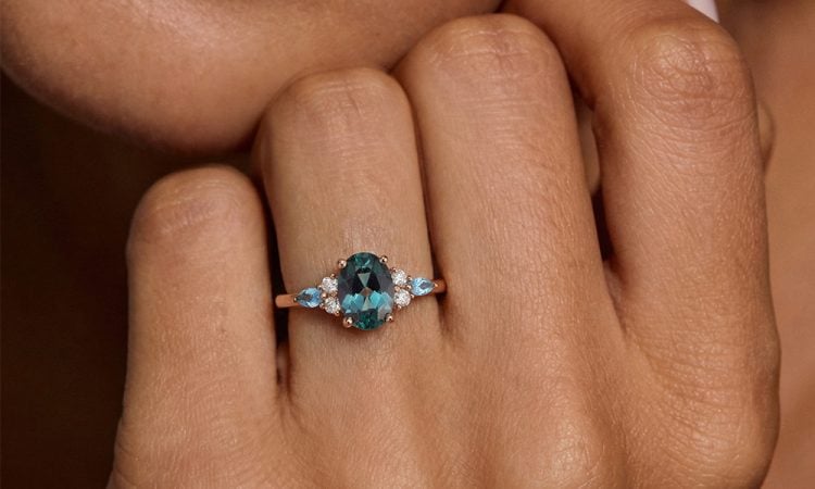 Oval Cut Gold Alexandrite Cluster Engagement Ring with Topaz Accents