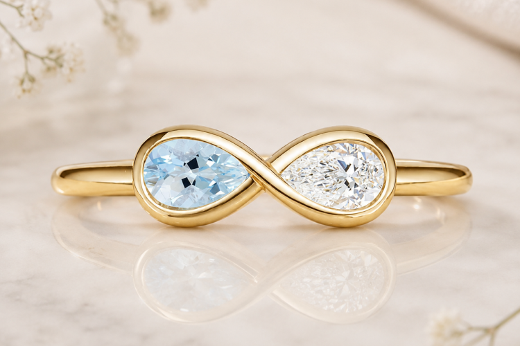 Pear cut aquamarine & lab diamond infinity toi et moi engagement ring