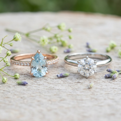 Comparing a Rose Gold Aquamarine Ring with a Traditional Diamond Ring