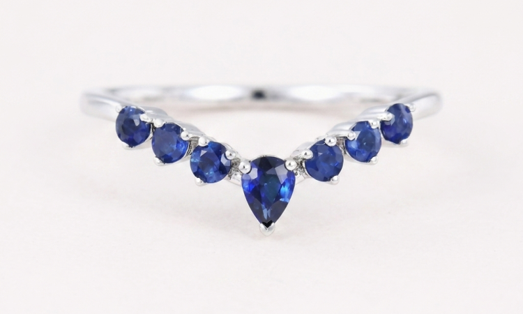 curved sapphire wedding band