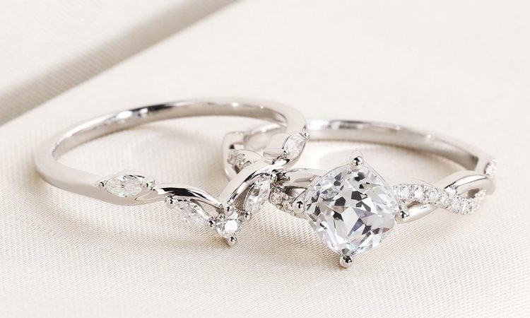 cushion cut engagement ring with curved wedding band